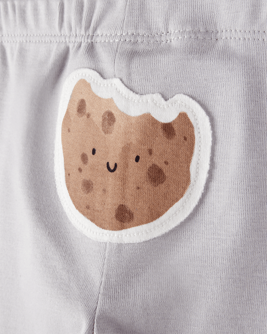 Conjunto tres piezas pantalón y dos bodies diseño galletitas
