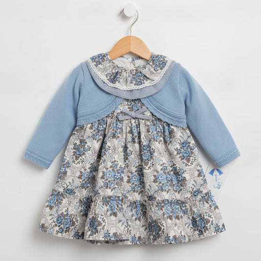 Conjunto de bebé niña de dos piezas con vestido floreado y chaqueta de punto celeste Modelo 26642 - Fabricado en España