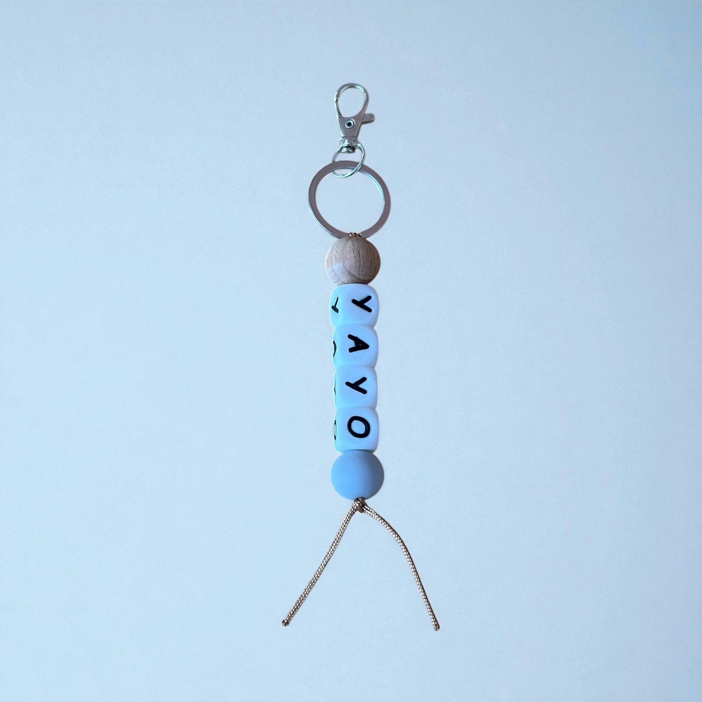 Llavero Gris  personalizado Nenina & Co