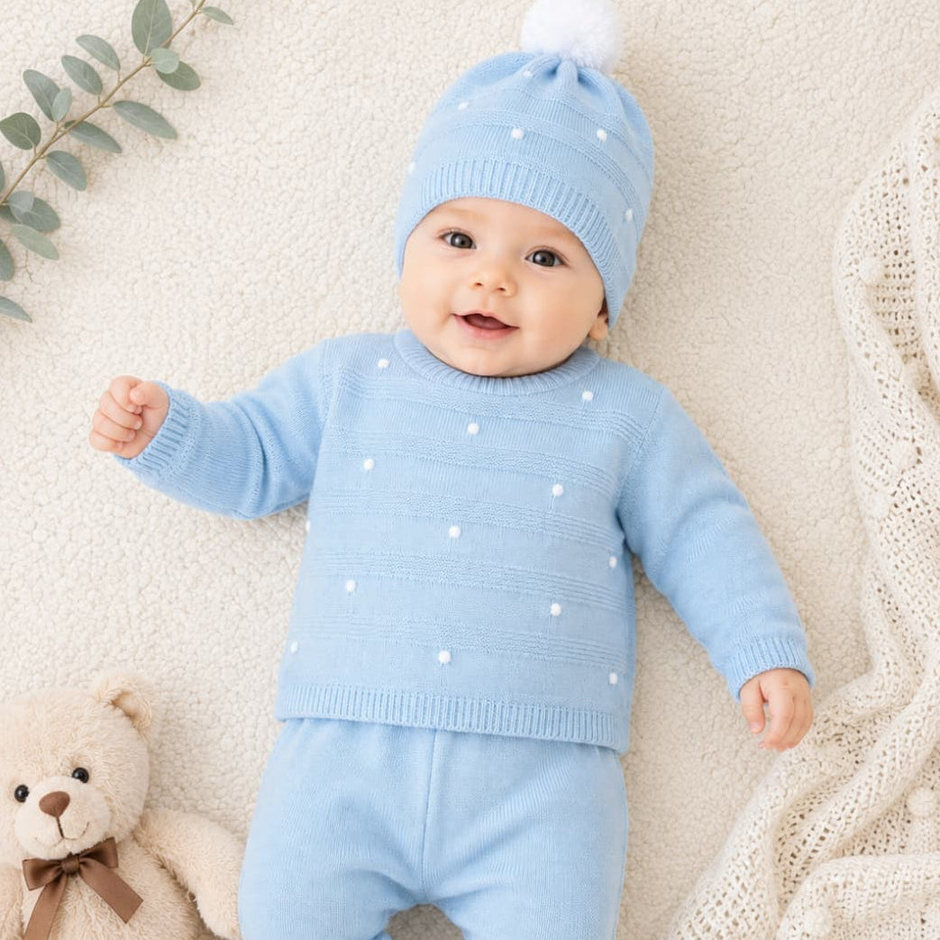 Conjunto de invierno para bebé de punto tres piezas en celeste con jersey, polaina y gorro con pompón Pelottas 621102012