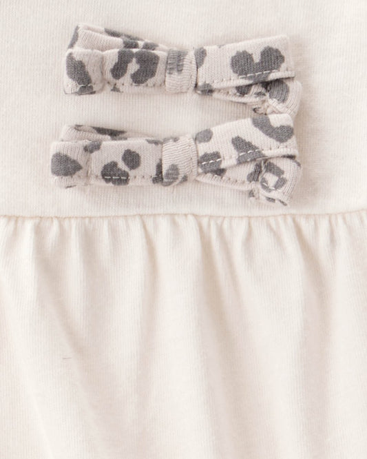 Conjunto 2 piezas con body de lazos y pantalón leopardo