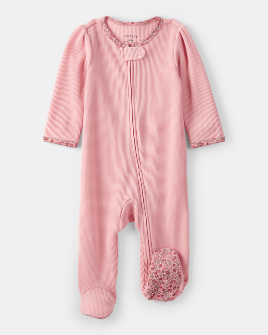 Pijama enterizo con pies y ribete floral en algodón acanalado