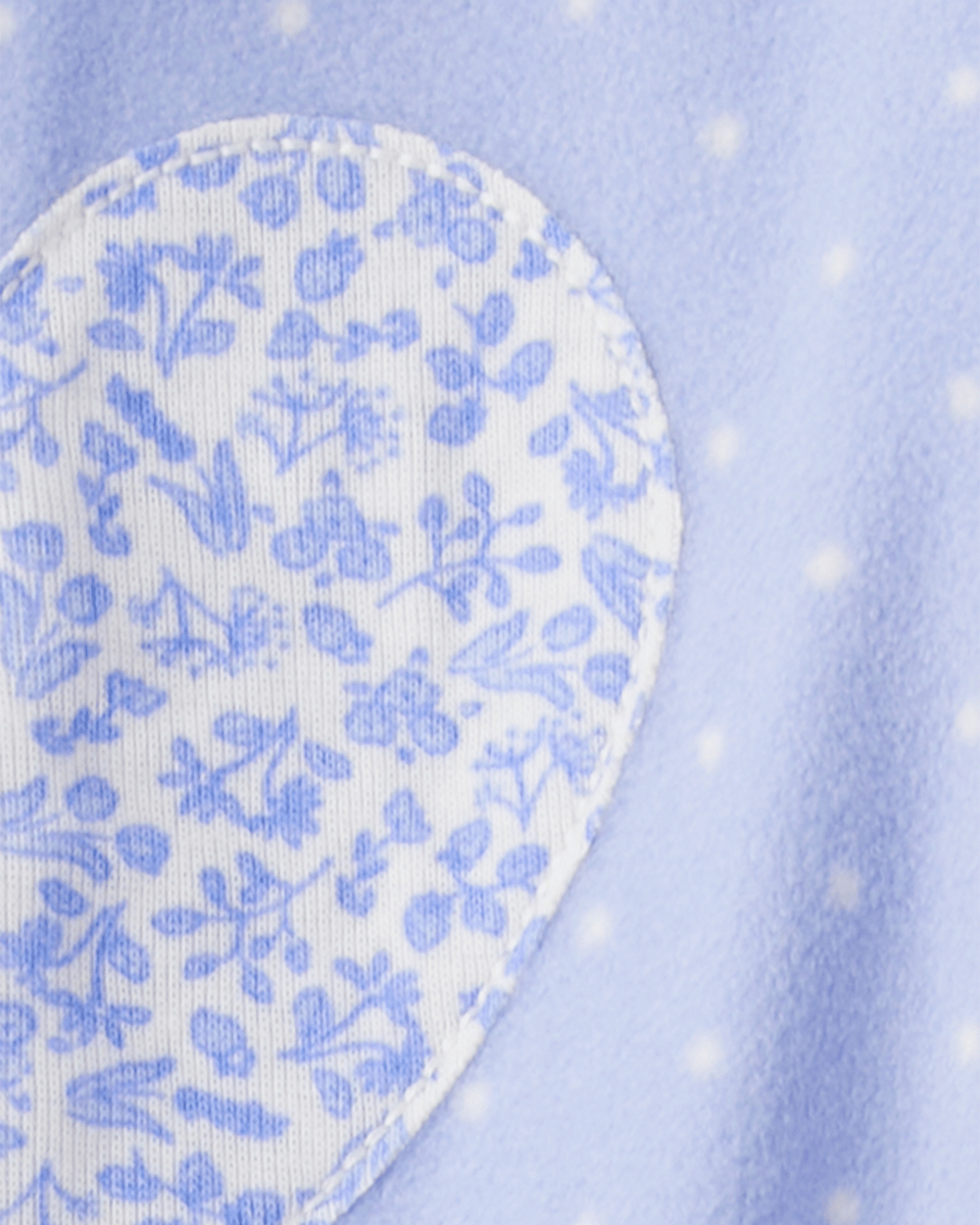 Pijama enterizo polar azul con corazones y lunares