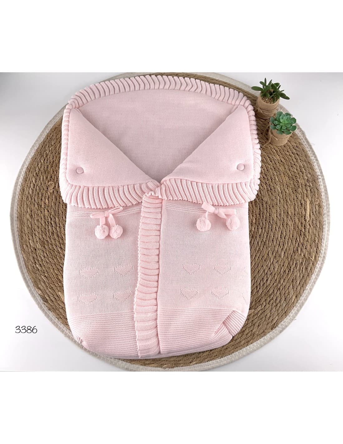 Saco de lana para bebé con pompones decorativos 521103386